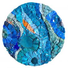 A mosaic of smalti glass in blues and greens